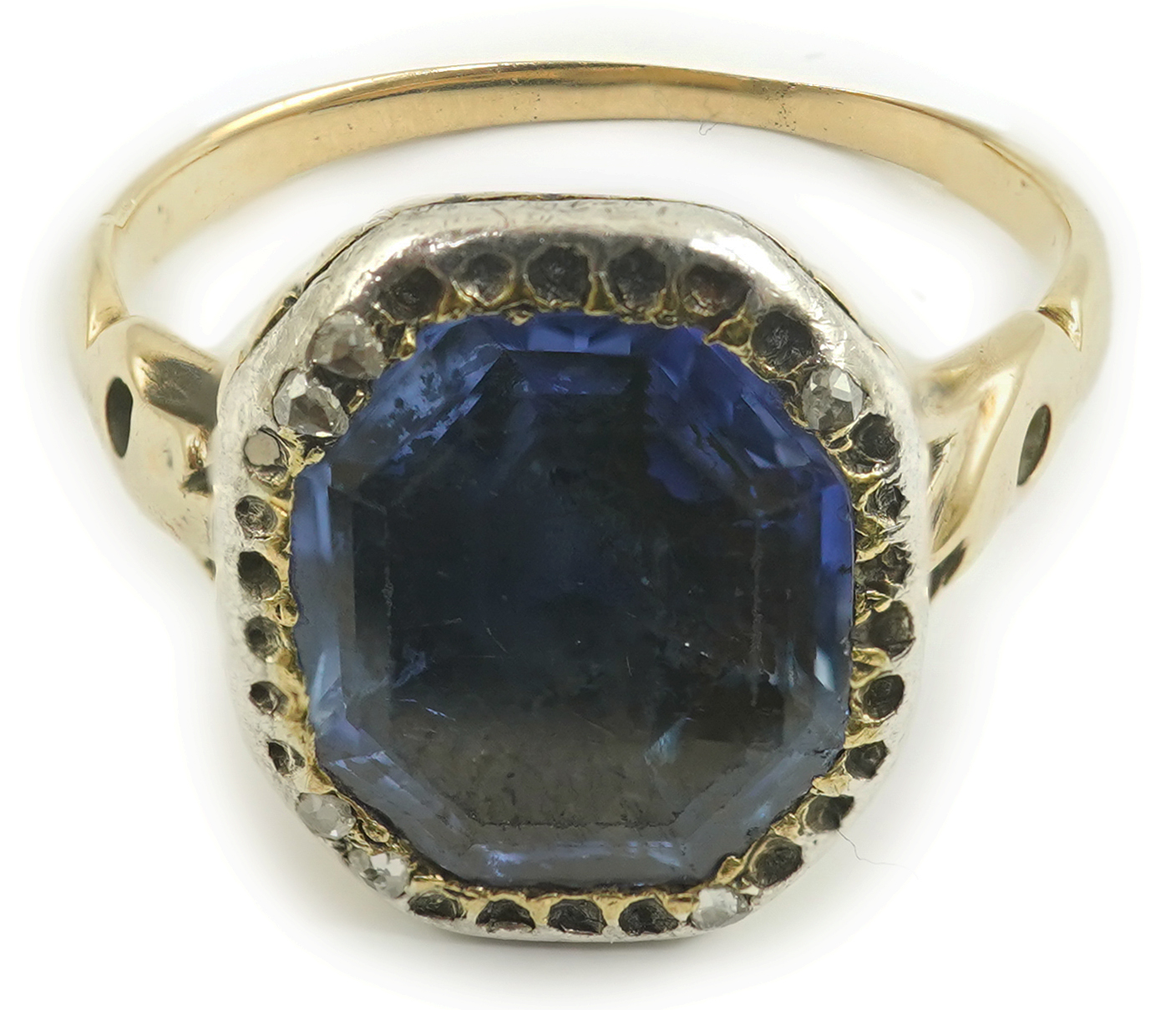 A Georgian gold and single stone collet set octagonal cut sapphire set ring